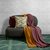 Плед из хлопка фактурной вязки бордового цвета из коллекции Essential, 130х180 см - Tkano